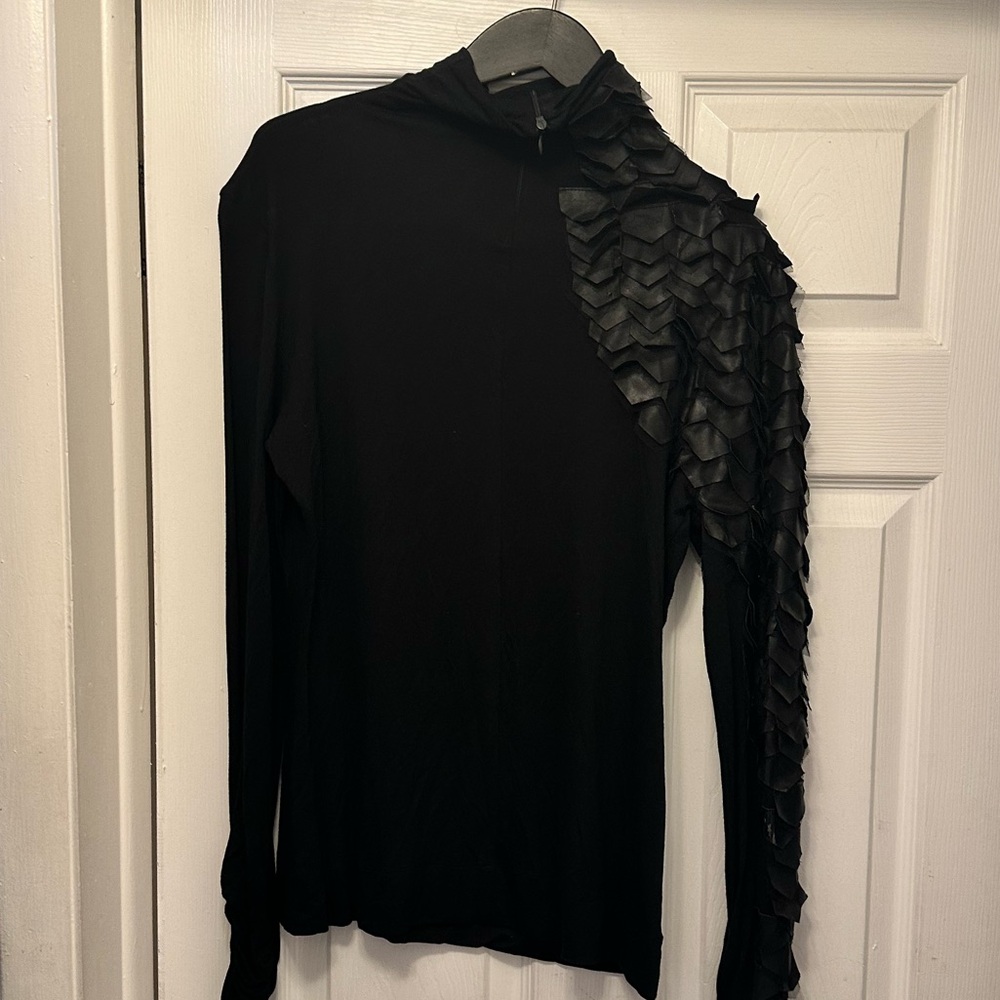 Long sleeve black faux leather on sleeve fitted top in size M
